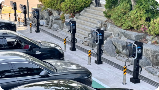 A stand-mounted slow charger installed on site