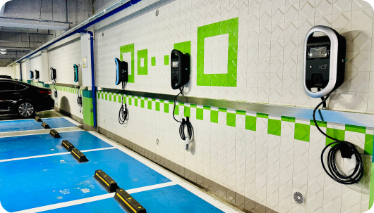 A wall-mounted slow charger installed on site